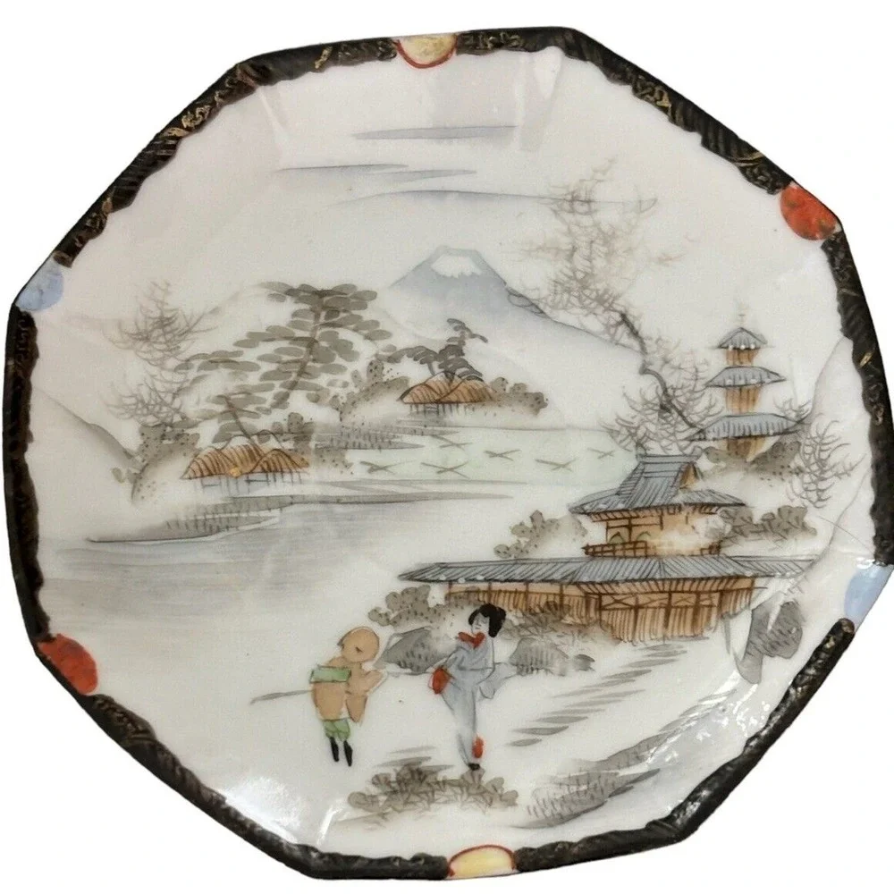 Kutani Egg Shell Porcelain Octagon Mountain Village Cup and Saucer Meiji Period
